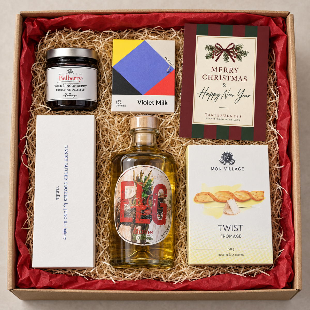 Julekasse 5 · Generøs med julegin, vaniljekranse, Ocelot chokolade, Belberry marmelade, Twist Fromage og julekort
